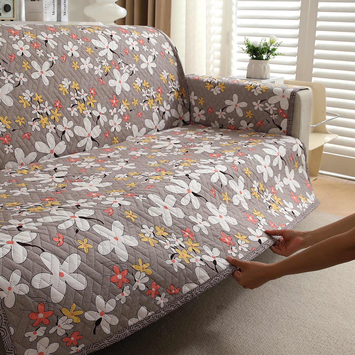 Pastel Brown Sandwort Flower Printed quilted sofa cover with anti slip elastic strap