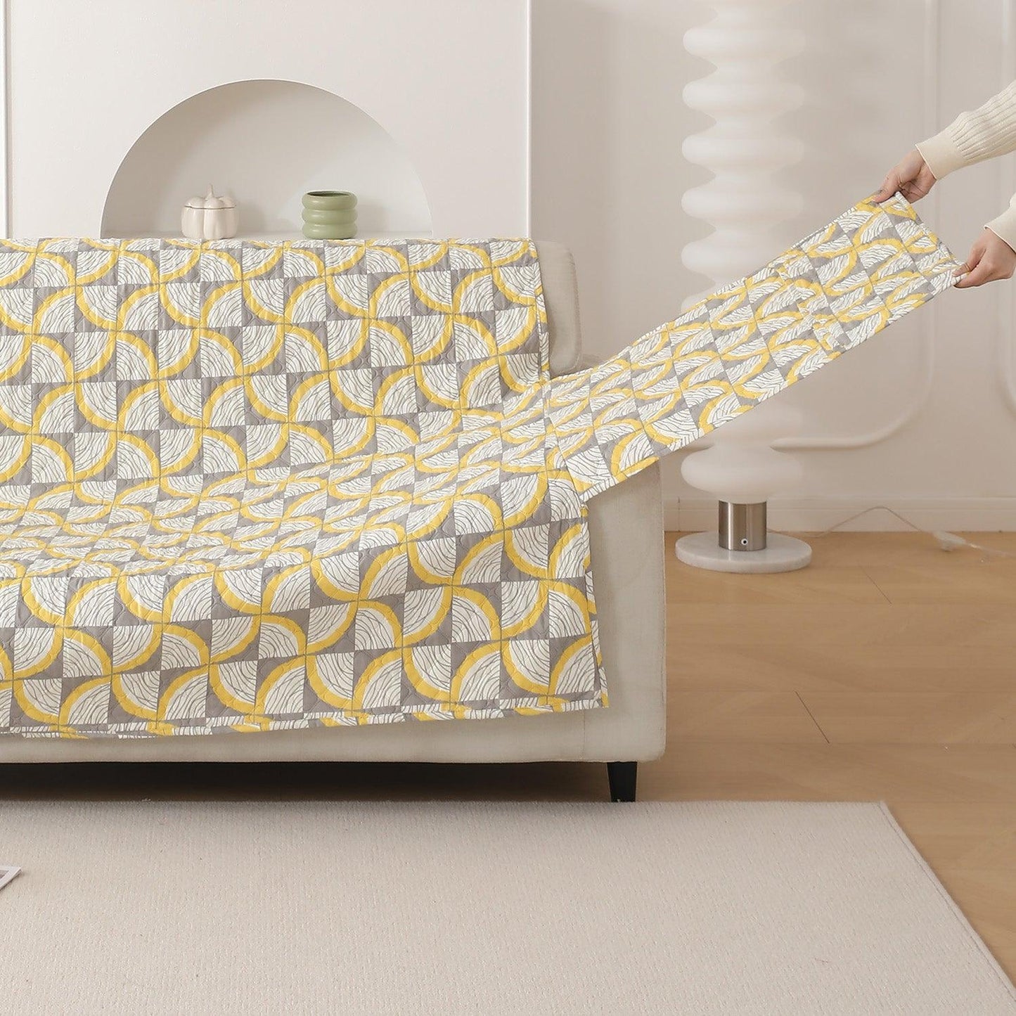 Windmill Cyber Yellow Printed quilted sofa cover with non slip elastic strap