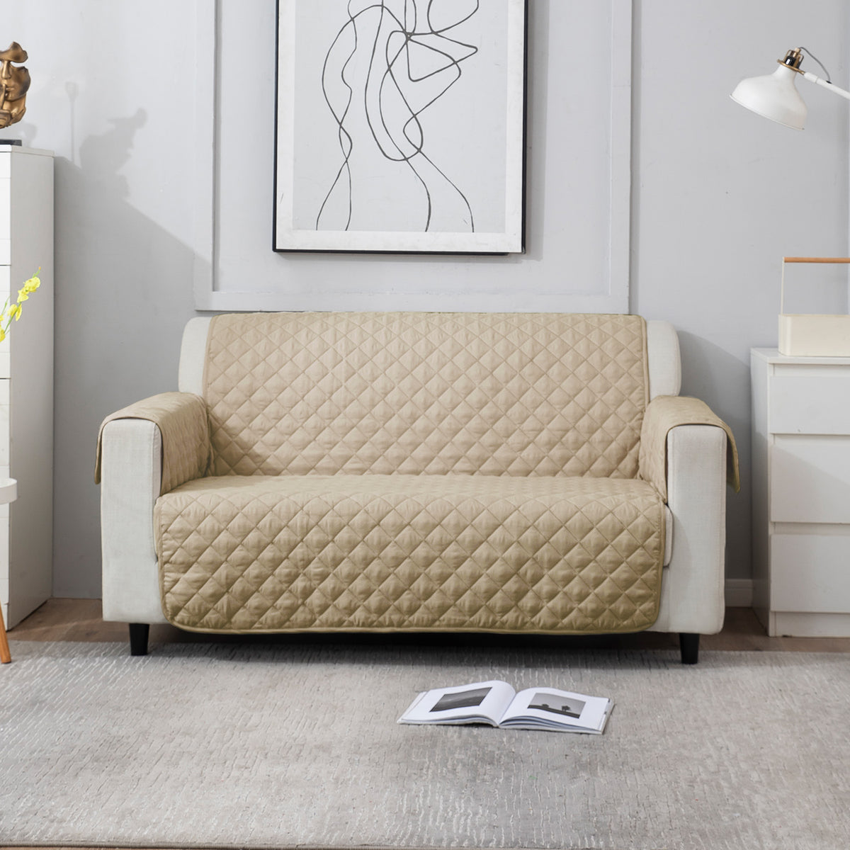 Beige quilted 2 seater sofa cover​ 