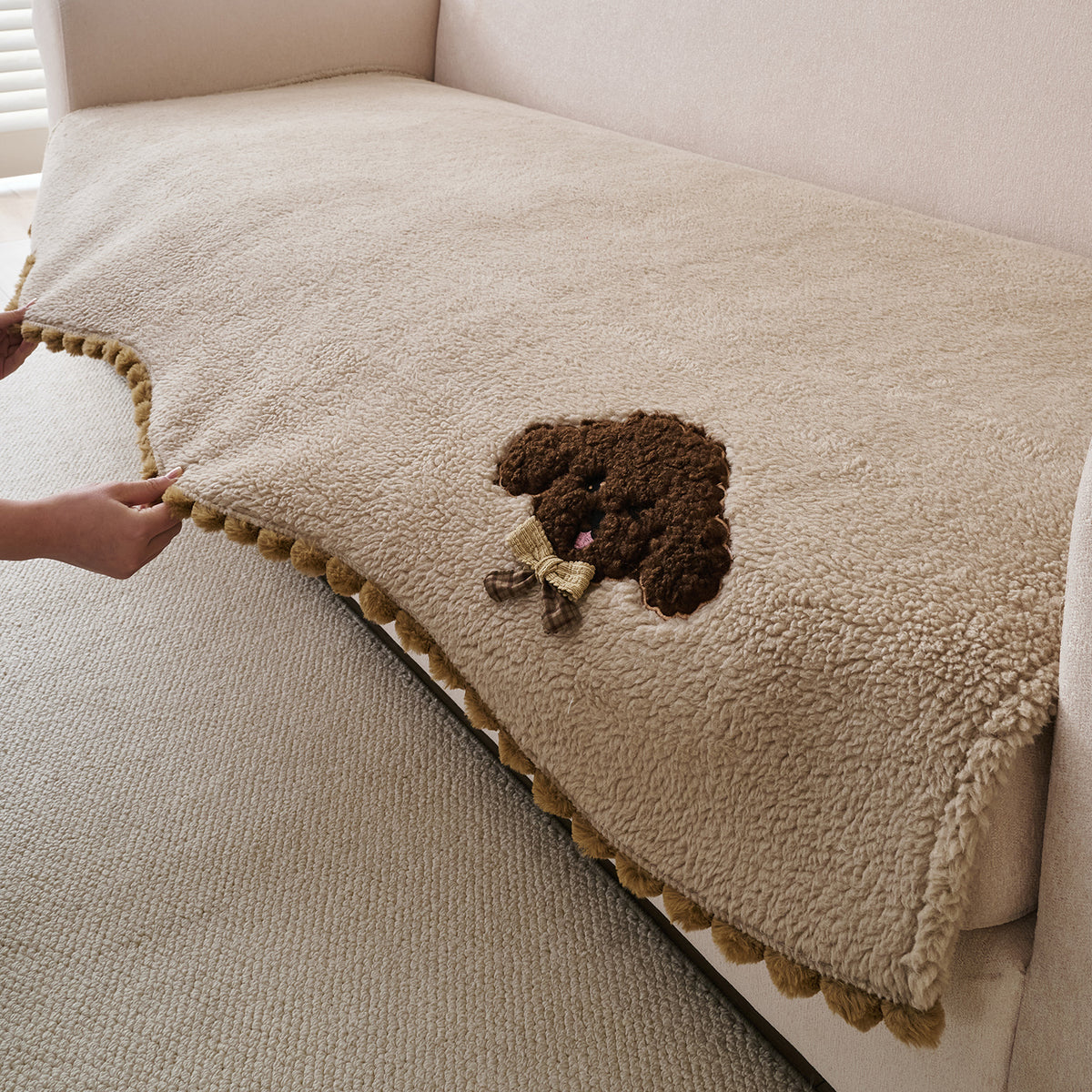 CloudHug Plush Sofa Cover Mat with PomPom and Wavy Edges, Vanilla Latte