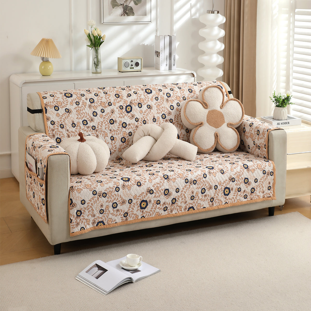 Light Peach Candytuft Printed three seater quilted sofa cover with armrest and side pockets