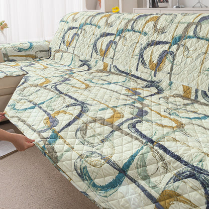 Elira Series Quilted One-Piece L Shape Sofa Cover Mat with Left and Right Chaise, Parchement Beige Abstract Art