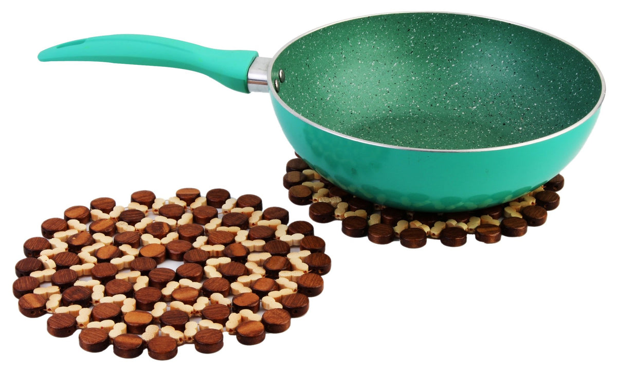 Buy Bamboo heat resistant trivet under frying pan on kitchen counter