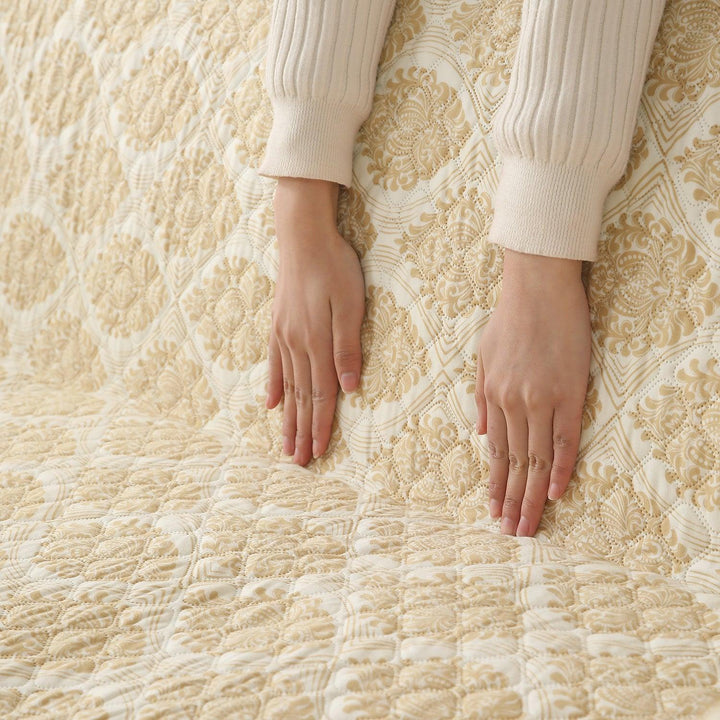 Ogee Ivory Printed quilted non slip sofa cover