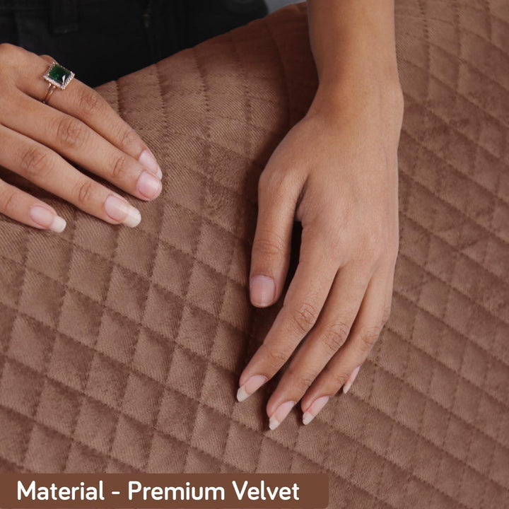 Close up photo of modern Russet Brown colour quilted Velvet sofa cover set
